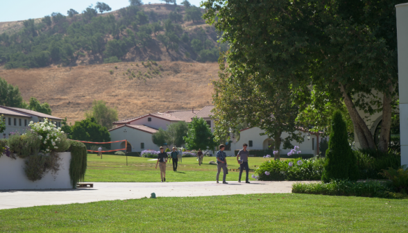 Students walk along academic quadrangle