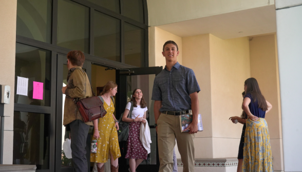 Students walk along academic quadrangle