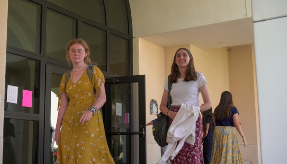 Students walk along academic quadrangle