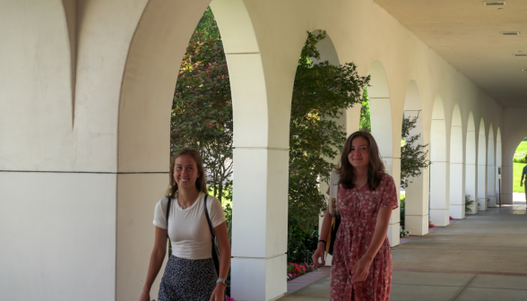 Students walk along academic quadrangle