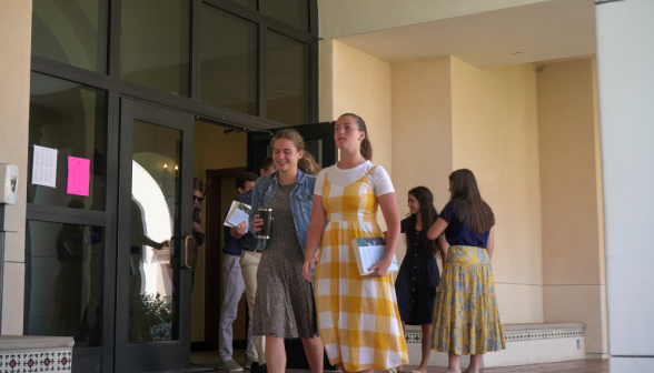 Students walk along academic quadrangle