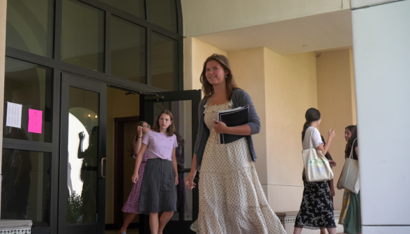 Students walk along academic quadrangle