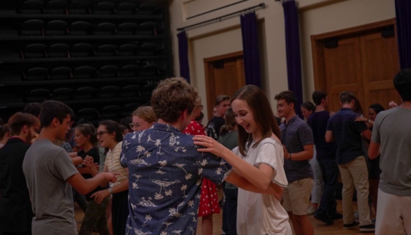 A couple works on their waltz position