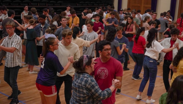 The students try a few waltz steps