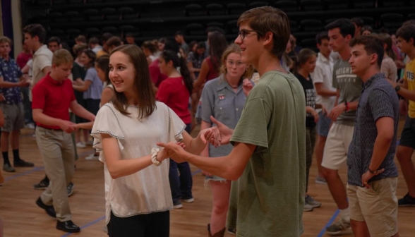 Students turn to listen to the instructor