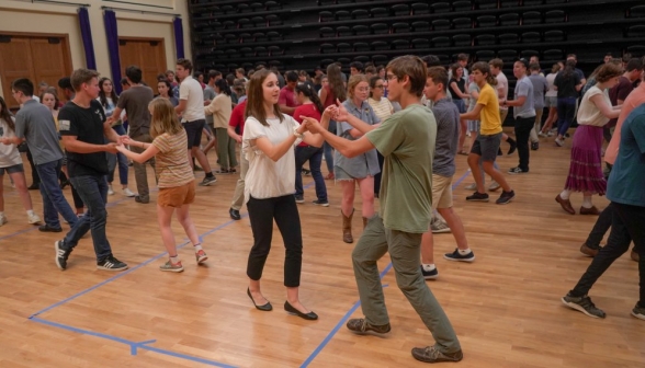 Long shot of all the students dancing