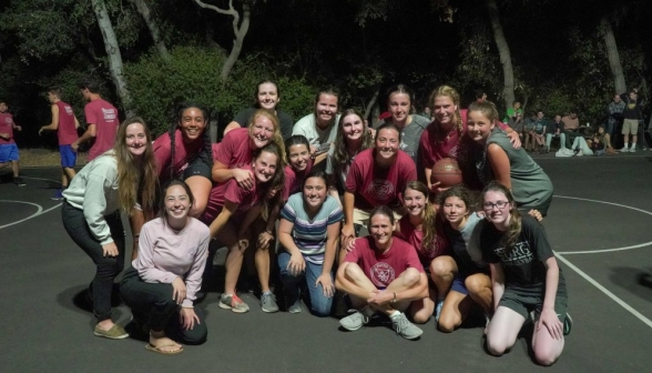 The women pose for a post-game photo