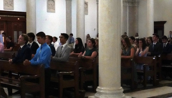 Students pray in adoration