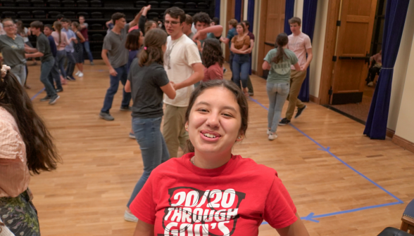 A student smiles for the camera