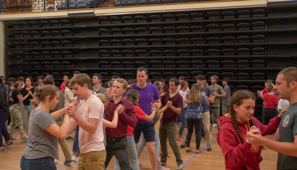 Students resume the waltz position