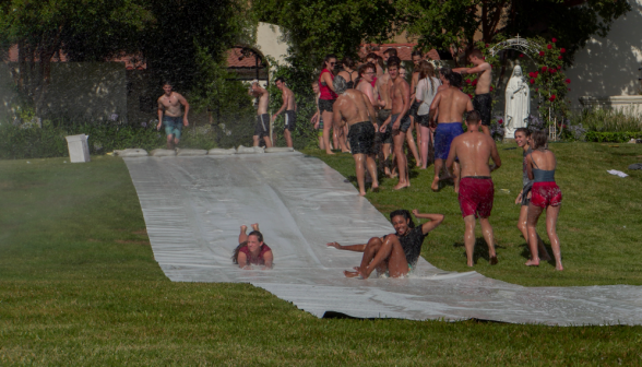 Two others take the slide