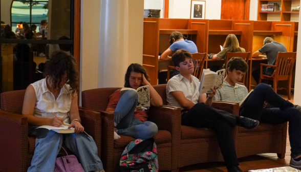 Students in the armchairs, reading their Flannery O'Connor