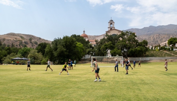 Students play a game of frisbee