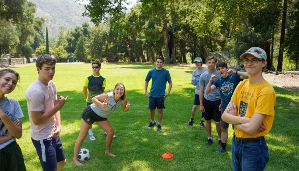 "Thumbs up" and "hang loose" from students before a game