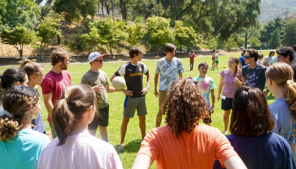 A ring of students prepares for a game