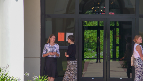 Students walk along academic quadrangle