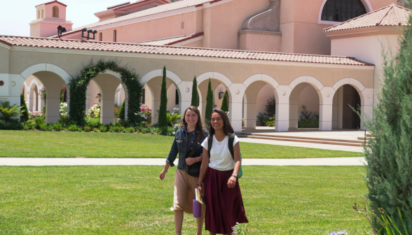 Students walk along academic quadrangle