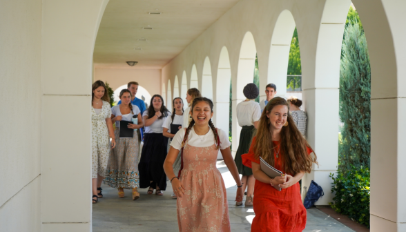 Students walk along academic quadrangle