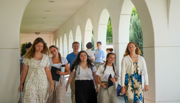 Students walk along academic quadrangle