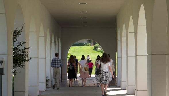 Students walk along academic quadrangle