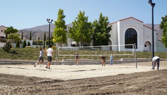 The students enjoy a game of volleyball