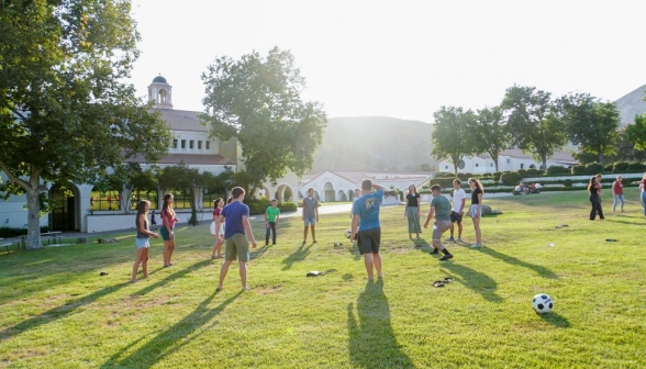 Some students prepare for a game of soccer