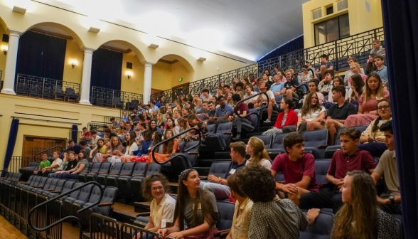 Students fill the seats at St. Cecilia Hall, awaiting the orientation lecture