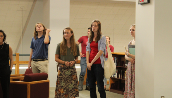 Students fill the main area of the library