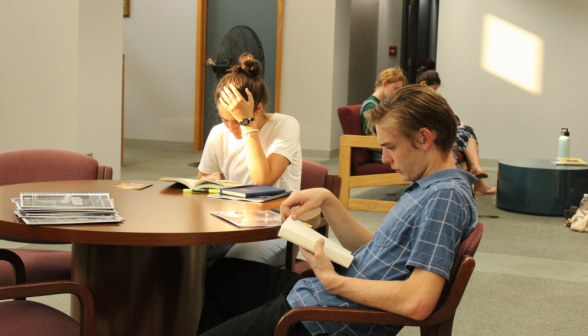 Two students at a round table