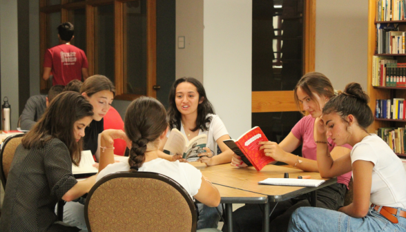 Six study around a hexagonal table