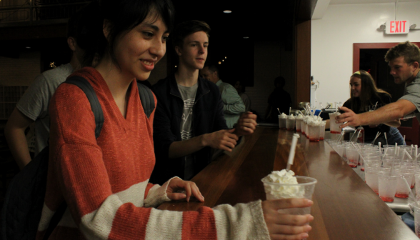 Students, coming up the counter and taking the sodas