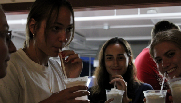 A group of students sipping on their sodas