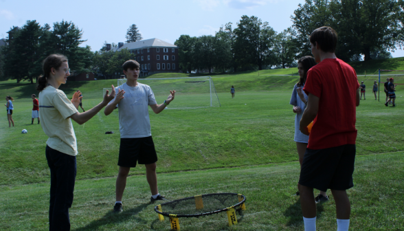 Students ready up for a game of Spikeball