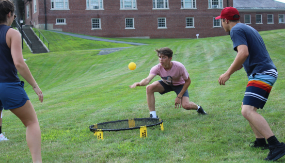 Closeup: the ball in midflight near the Spikeball net