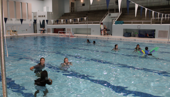 Students swimming in the pool