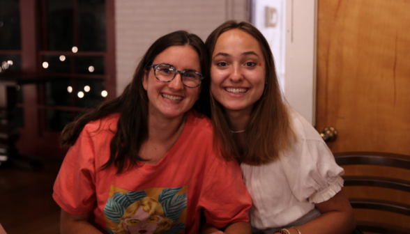 Two girls pose for a photo