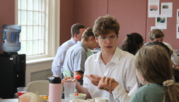 Two students in lunch-table discussion