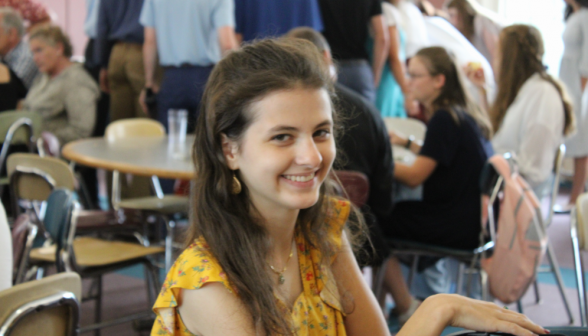 A student smiles for the camera