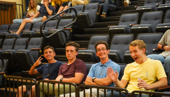 Students wave from their seats