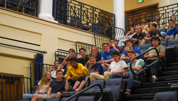 Students wave from their seats