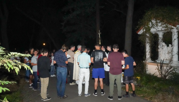 Students pray the Stations of the Cross