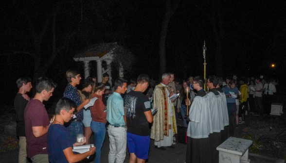 Students pray the Stations of the Cross