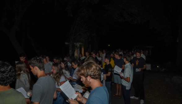 Students pray the Stations of the Cross