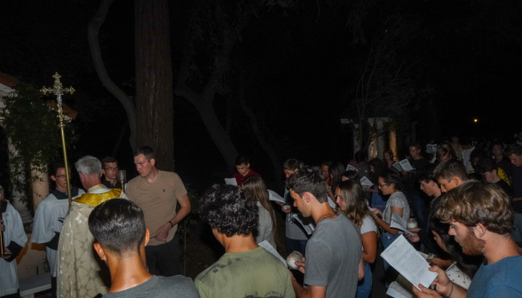 Students pray the Stations of the Cross