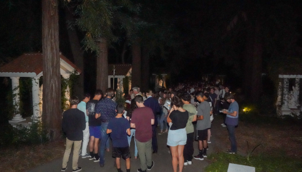 Students pray the Stations of the Cross