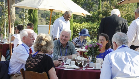 Six seated at the table, talking