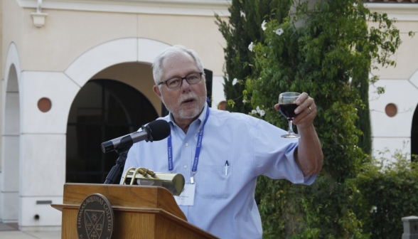 Dr. McLean proposes a toast