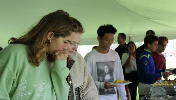 Difficult decisions: two thoughtful students assess their options at the cheese board