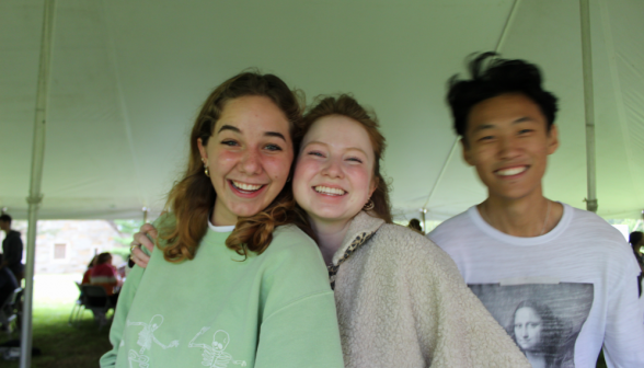 Three students pose for a picture