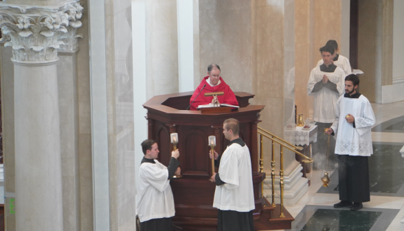 Fr. Paul Raftery, O.P. proclaims the Gospel